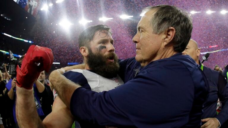 New England Patriots head coach Bill Belichick congratulates Julian Edelman after defeating the Atlanta Falcons in overtime at the NFL Super Bowl 51 football game Sunday, Feb. 5, 2017, in Houston. The Patriots defeated the Falcons 34-28.
